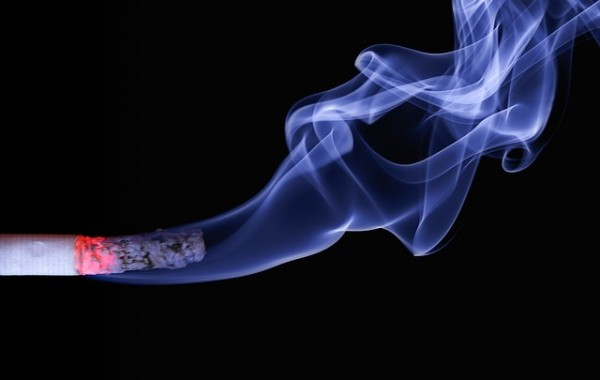 Cancer survivors who smoke perceive less risk from tobacco
