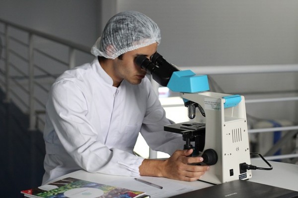A scientist analyzing cells 