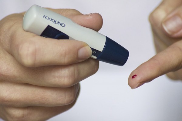 A Person taking a blood test for Diabetes