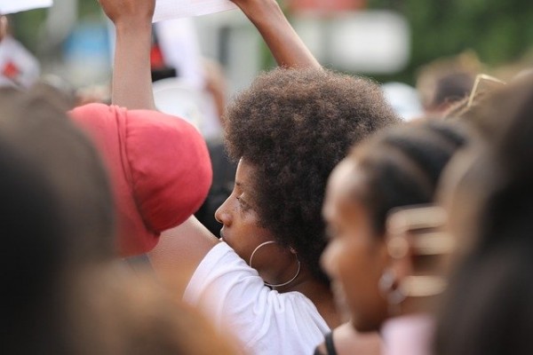 Is it safe to protest with a massive crowd behind your back?