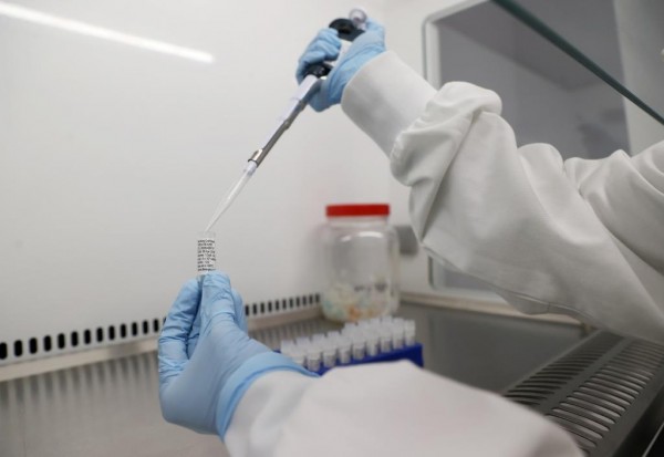 Scientists are seen working at Cobra Biologics, they are working on a potential vaccine for COVID-19, following the outbreak of COVID-19, in Keele, Britain.